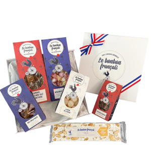 boite degustation ouverte avec 5 packs meli melo fruites, caramel, berlingots, reine de la ruche et tentation d amande et une barranougat le bonbon francais