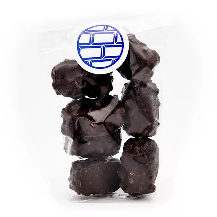 Bouchée de praliné enrobé de chocolat noir - Le Bonbon Français packshot bouché de praliné enrobé de chocolat noir, bonbon de chocolat, papillote, bonbon artisanal, confiserie artisanal, chocolat artisanal, le bonbon français